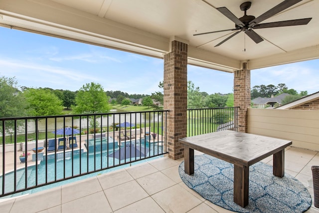 24818 Waterstone Estates Cir W, Tomball, TX 77375 - balcony with ceiling fan and a patio area