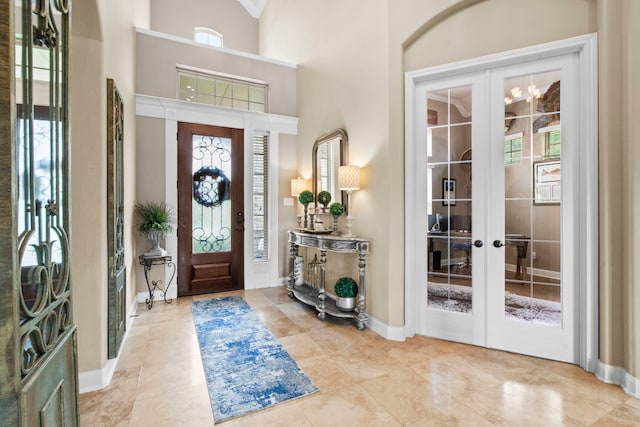 24818 Waterstone Estates Cir W, Tomball, TX 77375 - foyer with baseboards and french doors