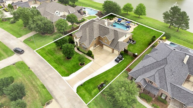 24818 Waterstone Estates Cir W, Tomball, TX 77375 - aerial view featuring a water view and a residential view