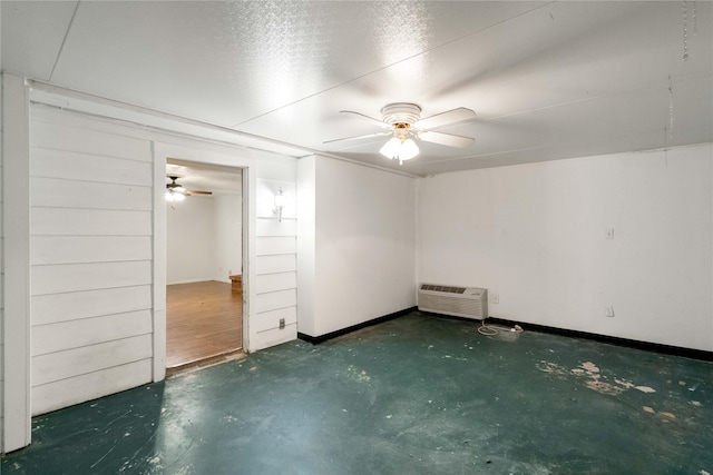 unfurnished bedroom featuring baseboards, concrete flooring, and ceiling fan