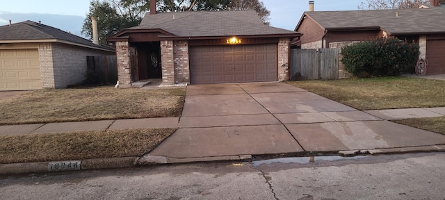 19944 Mountain Dale Dr, Cypress, TX 77433 - view of front facade with brick siding, fence, and driveway