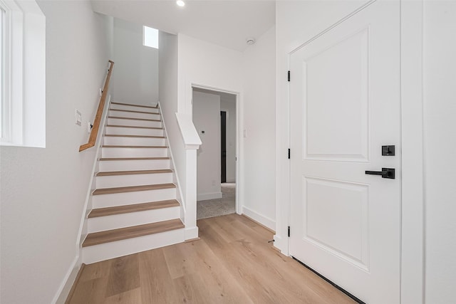 3114 Orange St, Houston, TX 77020 - stairs featuring baseboards, recessed lighting, and wood finished floors