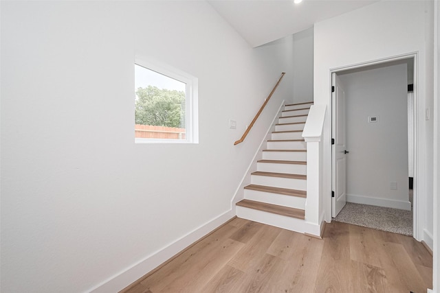 3114 Orange St, Houston, TX 77020 - stairway with baseboards and wood finished floors