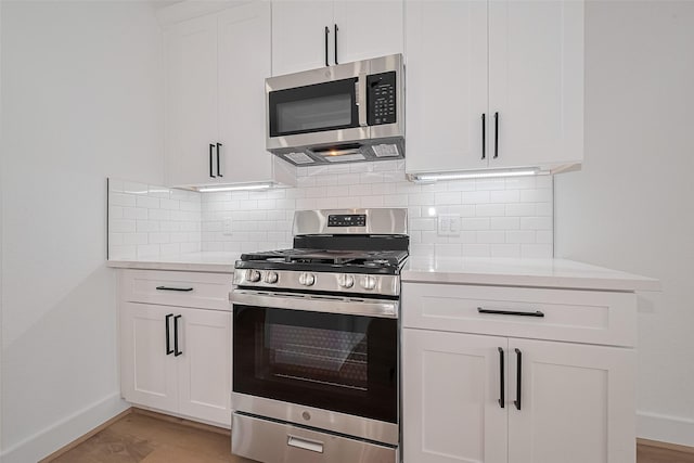 3114 Orange St, Houston, TX 77020 - kitchen with light countertops, baseboards, and stainless steel appliances