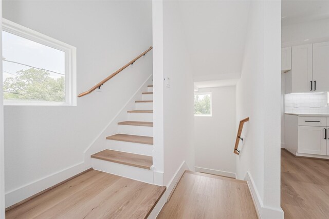 3114 Orange St, Houston, TX 77020 - staircase with wood finished floors