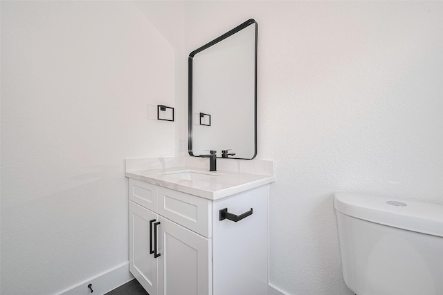 3114 Orange St, Houston, TX 77020 - half bathroom with vanity, baseboards, and toilet