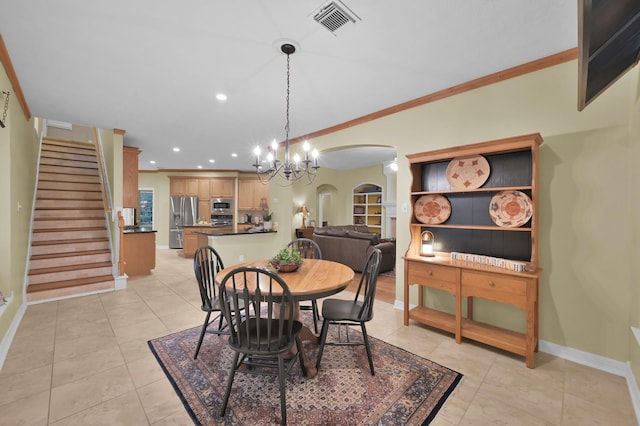 13262 Royal Rdg, Conroe, TX 77302 - dining space with a chandelier, arched walkways, baseboards, stairway, and light tile patterned floors