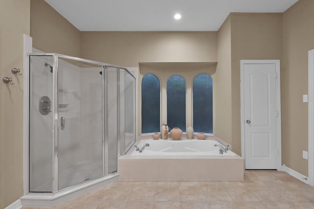 13262 Royal Rdg, Conroe, TX 77302 - full bath with a stall shower, a bath, and baseboards