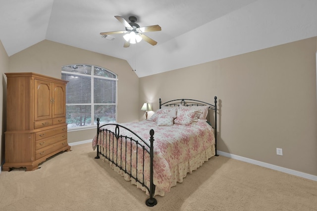 13262 Royal Rdg, Conroe, TX 77302 - bedroom with light carpet, lofted ceiling, baseboards, and a ceiling fan