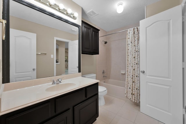 13262 Royal Rdg, Conroe, TX 77302 - full bathroom featuring toilet, tile patterned flooring, vanity, and shower / tub combo