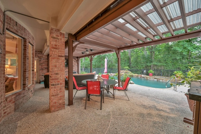 13262 Royal Rdg, Conroe, TX 77302 - fenced backyard with a patio area, outdoor dining space, and a pool with connected hot tub