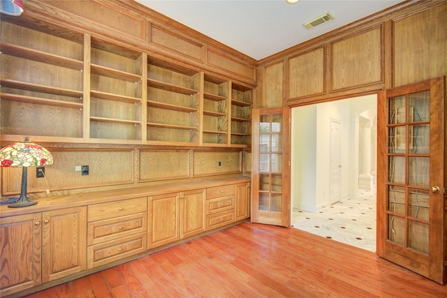 16 Treverstone Ct, Sugar Land, TX 77479 - interior space with french doors, light wood finished floors, and visible vents