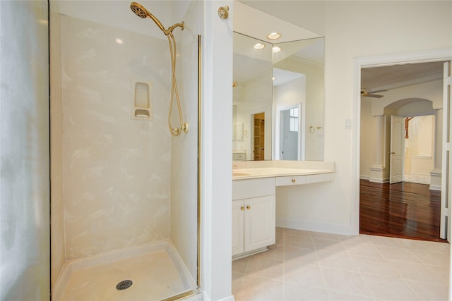 16 Treverstone Ct, Sugar Land, TX 77479 - bathroom featuring vanity, baseboards, ceiling fan, recessed lighting, and a shower stall