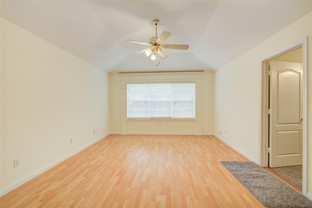 16 Treverstone Ct, Sugar Land, TX 77479 - empty room with light wood-style floors, baseboards, ceiling fan, and lofted ceiling
