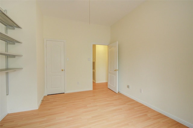 16 Treverstone Ct, Sugar Land, TX 77479 - unfurnished room featuring baseboards and light wood-style flooring
