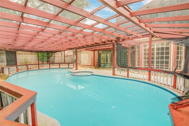 16 Treverstone Ct, Sugar Land, TX 77479 - view of swimming pool with fence, a pergola, and a pool with connected hot tub
