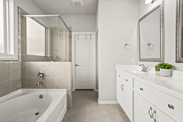 bathroom with a garden tub, visible vents, a shower stall, a sink, and tile patterned floors