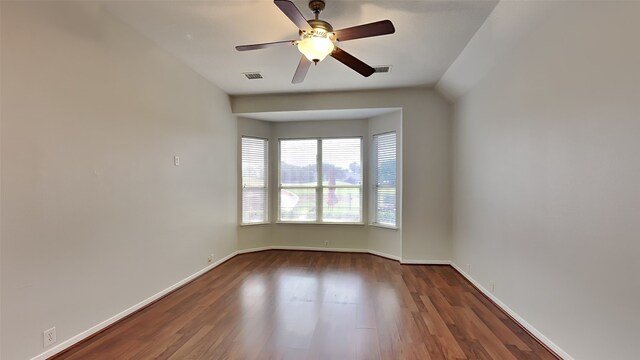 12107 Canyon Mills Dr, Houston, TX 77095 - spare room featuring wood finished floors, baseboards, and a ceiling fan