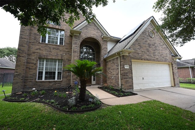 12107 Canyon Mills Dr, Houston, TX 77095 - view of front facade with concrete driveway and a garage