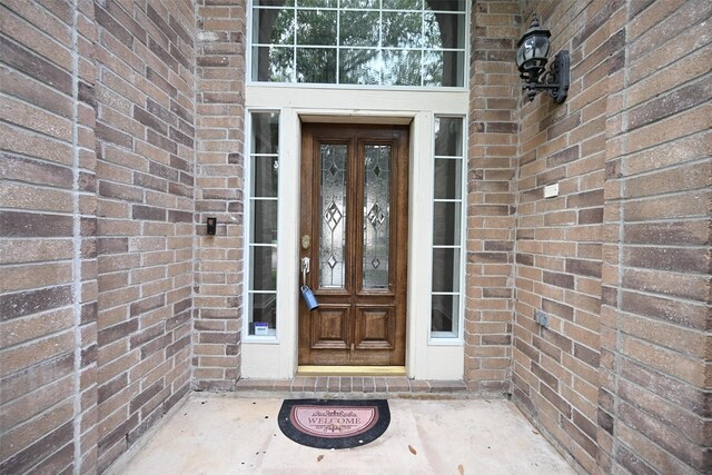 12107 Canyon Mills Dr, Houston, TX 77095 - view of exterior entry with brick siding
