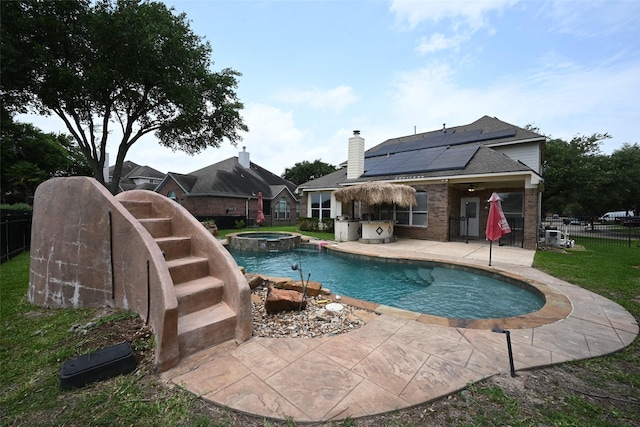12107 Canyon Mills Dr, Houston, TX 77095 - view of swimming pool featuring a patio area and a pool with connected hot tub