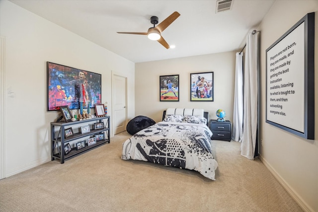 carpeted bedroom with baseboards, visible vents, and ceiling fan