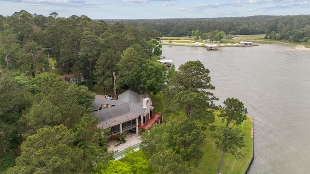 aerial view featuring a water view and a forest view