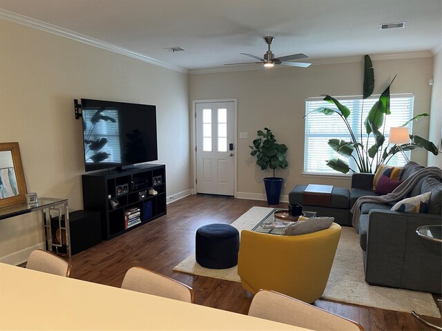 4327 Robertson St, Houston, TX 77009 - living room featuring crown molding, a ceiling fan, wood finished floors, and visible vents