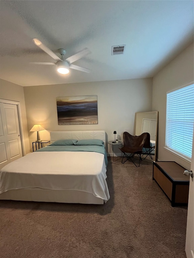 4327 Robertson St, Houston, TX 77009 - carpeted bedroom with visible vents and ceiling fan