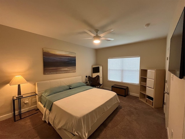4327 Robertson St, Houston, TX 77009 - bedroom featuring dark colored carpet, a ceiling fan, and baseboards