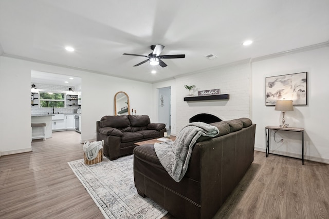living room featuring ceiling fan, recessed lighting, wood finished floors, and visible vents