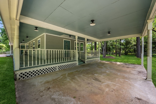 view of patio featuring a ceiling fan and covered porch