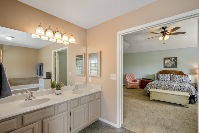 11203 Rocky Mill Dr, Cypress, TX 77429 - full bath with a sink, a ceiling fan, ensuite bath, and a garden tub