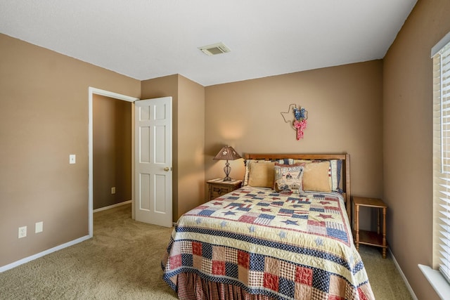 11203 Rocky Mill Dr, Cypress, TX 77429 - bedroom featuring baseboards, visible vents, and carpet