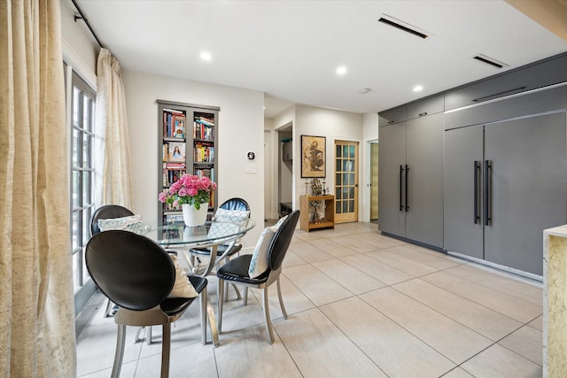 dining space with visible vents, recessed lighting, and light tile patterned floors