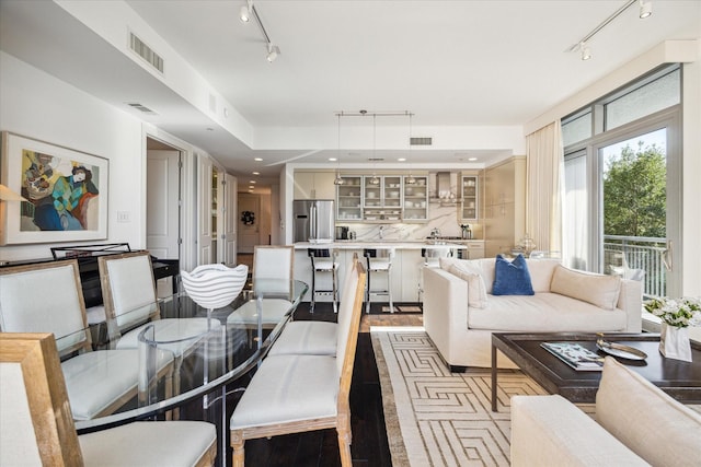2207 Bancroft St Unit 301, Houston, TX 77027 - living room featuring track lighting and wood finished floors