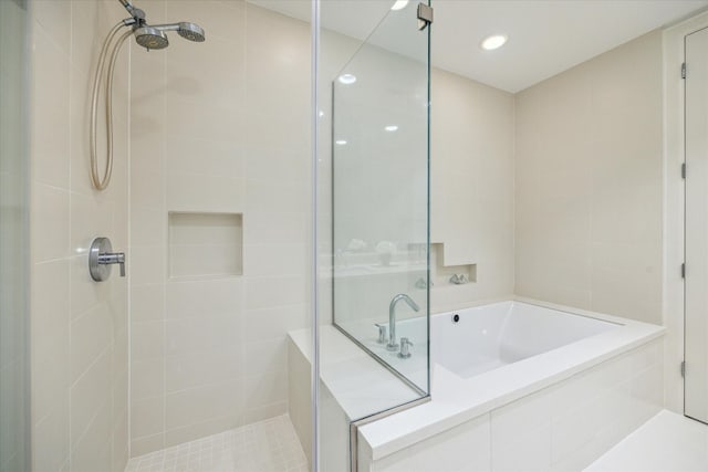 2207 Bancroft St Unit 301, Houston, TX 77027 - full bathroom featuring a tile shower and a bath