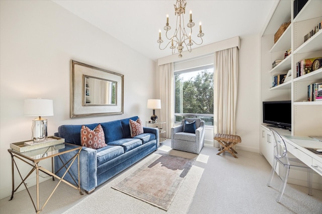 2207 Bancroft St Unit 301, Houston, TX 77027 - living room with light colored carpet, a desk, a chandelier, and baseboards