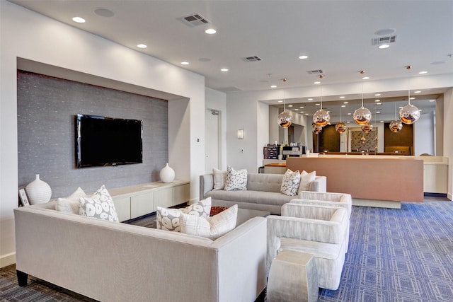 2207 Bancroft St Unit 301, Houston, TX 77027 - living room featuring carpet floors, baseboards, and recessed lighting