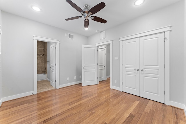 unfurnished bedroom featuring visible vents, recessed lighting, baseboards, and light wood-type flooring