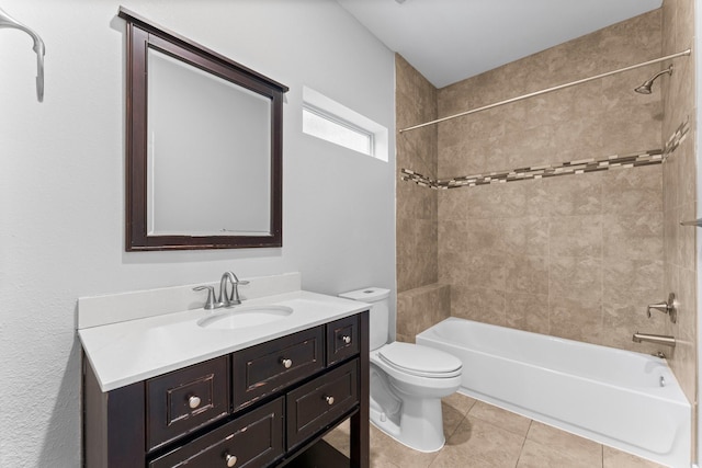 full bathroom featuring toilet, tile patterned floors, shower / washtub combination, and vanity