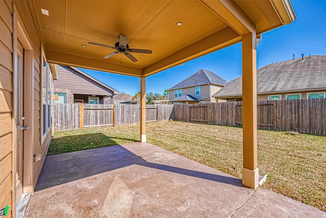 view of patio featuring a ceiling fan and a fenced backyard