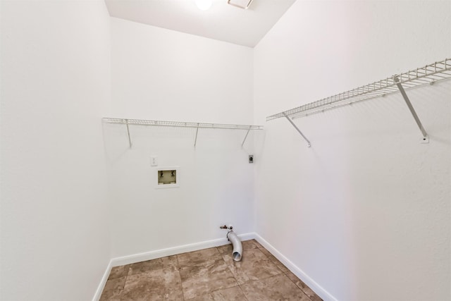 laundry room featuring laundry area, hookup for a washing machine, baseboards, and hookup for an electric dryer
