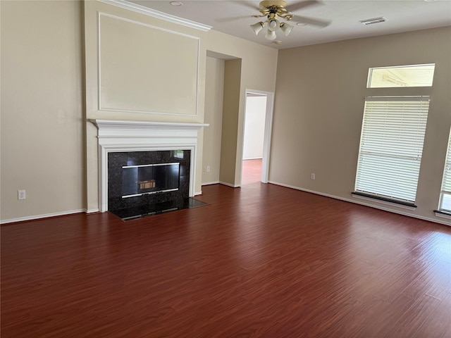 17235 Eden Falls Ct, Houston, TX 77095 - unfurnished living room featuring dark wood-style floors, ceiling fan, and a fireplace