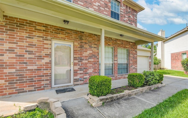 2810 Green Lodge Cir, Spring, TX 77373 - entrance to property with brick siding and an attached garage