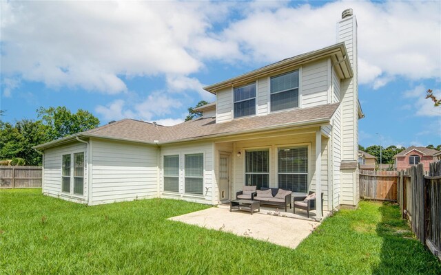 2810 Green Lodge Cir, Spring, TX 77373 - rear view of house with a fenced backyard, a chimney, an outdoor living space, and a patio area
