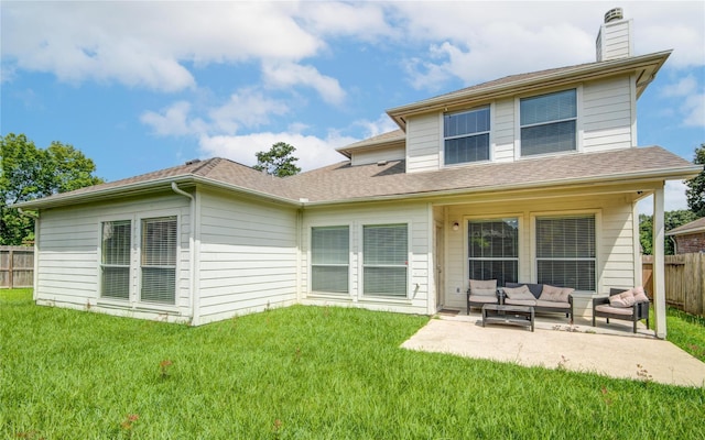 2810 Green Lodge Cir, Spring, TX 77373 - rear view of house featuring fence, outdoor lounge area, a chimney, a patio area, and a lawn