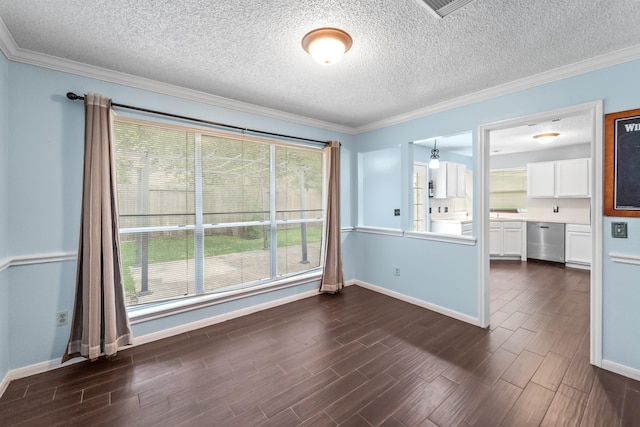 unfurnished room with a textured ceiling, baseboards, dark wood-style floors, and ornamental molding