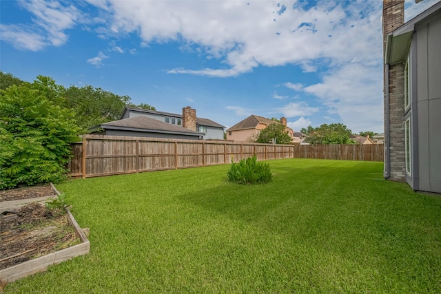 1709 Coles Farm Dr, Sugar Land, TX 77478 - view of yard featuring a garden