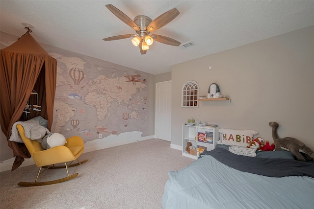 1709 Coles Farm Dr, Sugar Land, TX 77478 - bedroom featuring carpet, a ceiling fan, baseboards, and a textured ceiling
